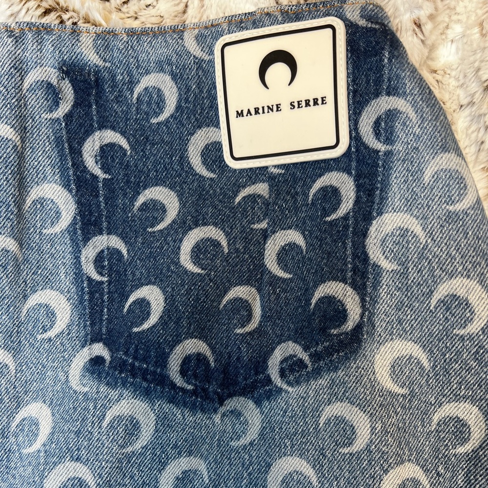 MARINE SERRE
MOONED UPCYCLED DENIM SKIRT